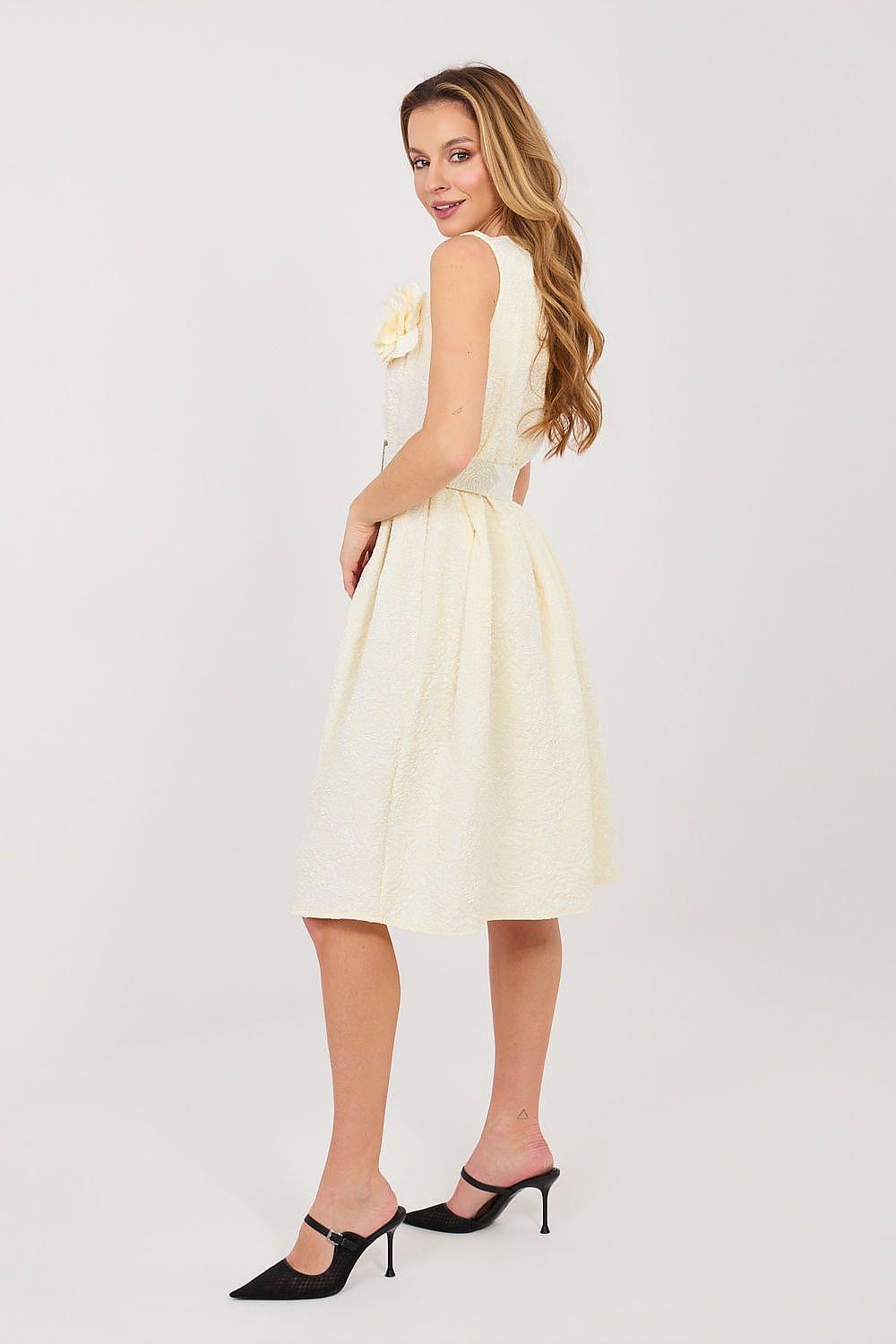 Cocktail dress side view, sleeveless fitted bodice with ruffle detail, light yellow