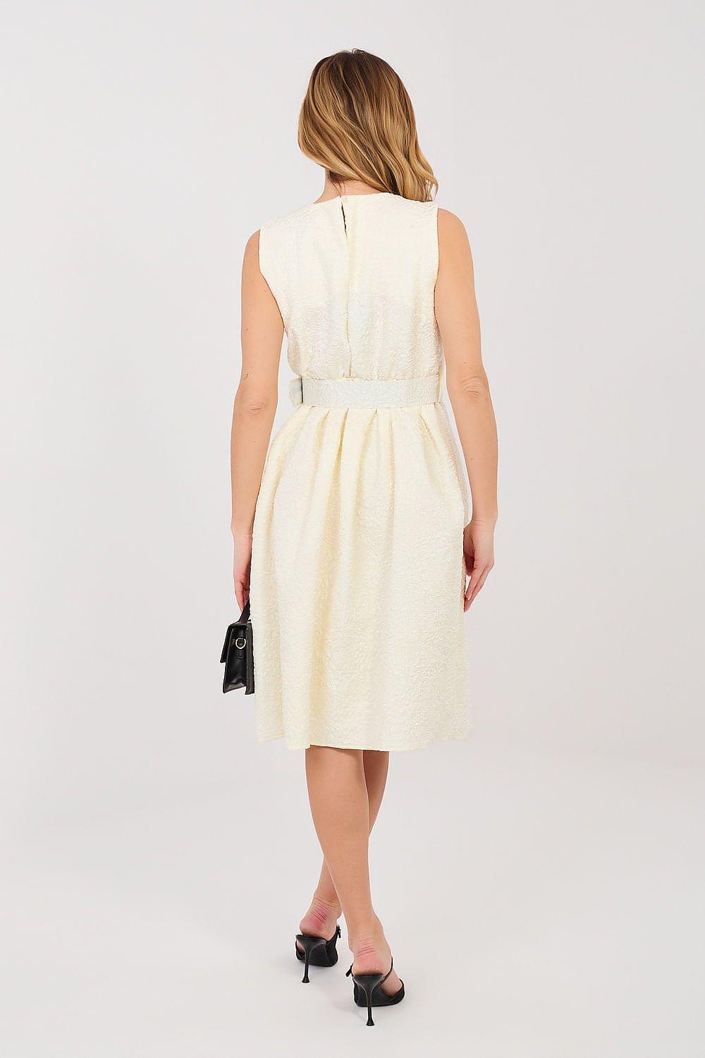 Cocktail dress back side view, sleeveless gathered waist, light yellow textured fabric