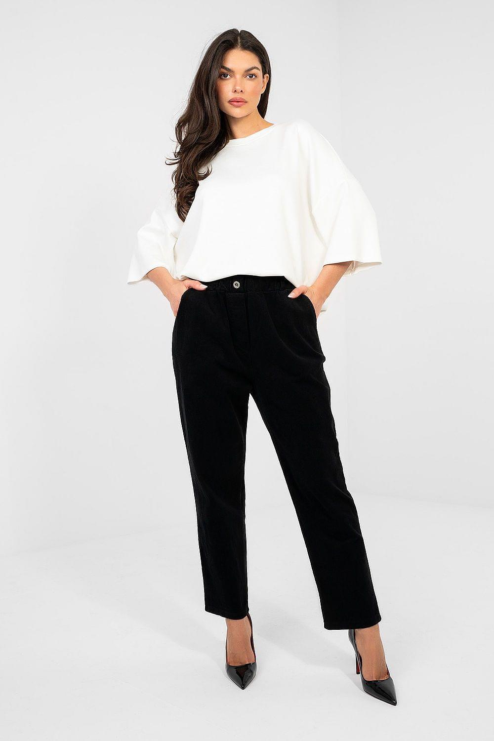 Black corduroy trousers with button-front waistband, cuffed ankle length