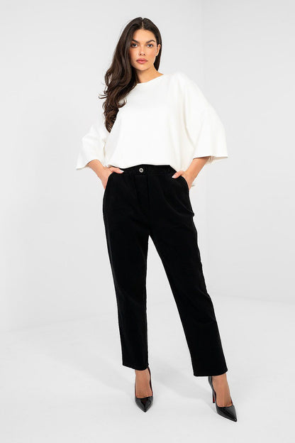 Black corduroy trousers, cropped length, button-front waistband and side pockets