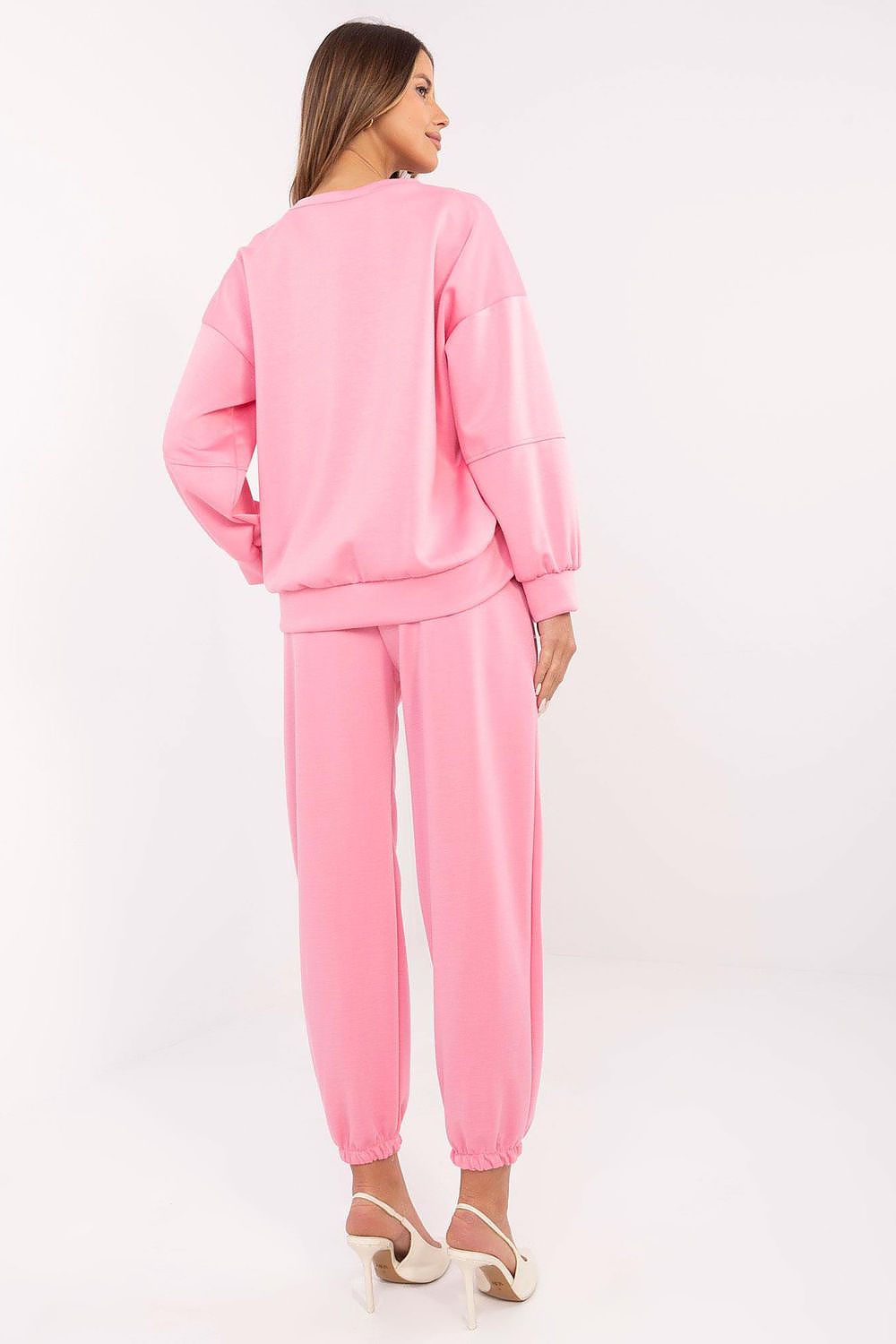 Pink back view of sweatshirt and jogger pants with tapered cuffs and relaxed fit