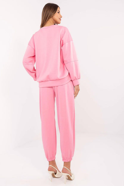 Pink back view of sweatshirt and jogger pants with tapered cuffs and relaxed fit