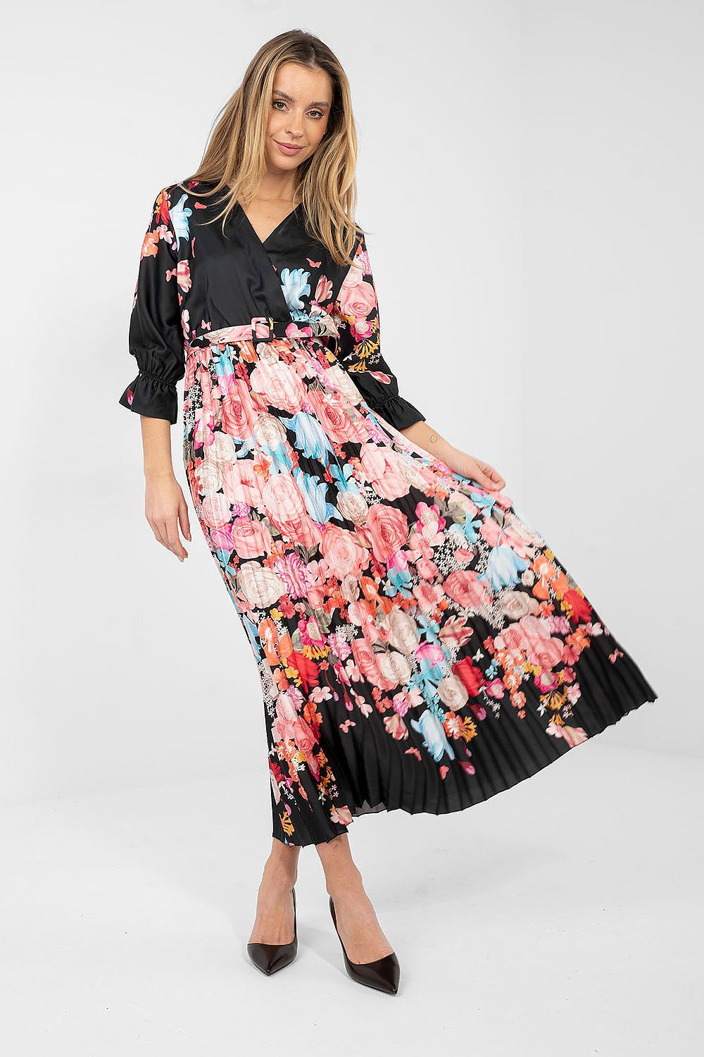 Black floral daydress with ¾ puff sleeves and pleated skirt