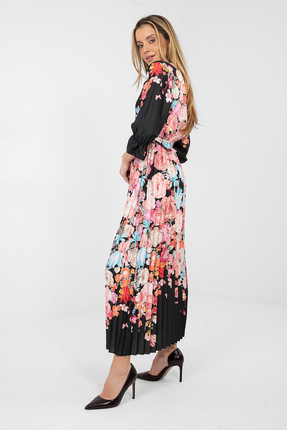 Black floral daydress with ¾ puff sleeves, pleated skirt and waist tie belt