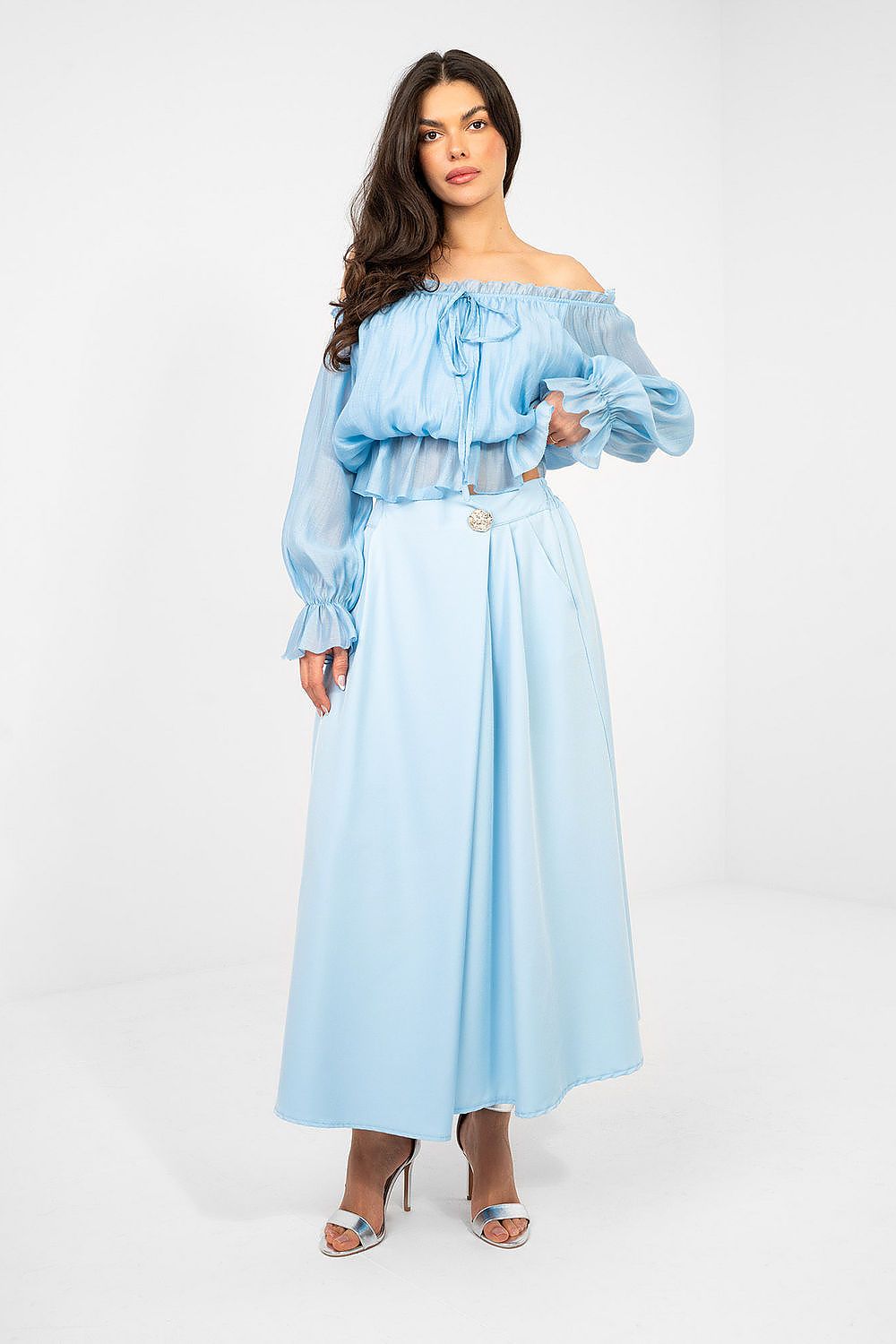 Light blue midi skirt with gathered waistband and front button detail
