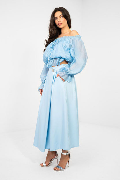 Light blue midi skirt with gathered waist and tapered A-line silhouette