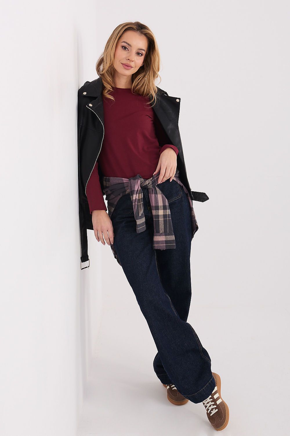 Burgundy long-sleeve crew-neck blouse, slim fit with slightly gathered waist.