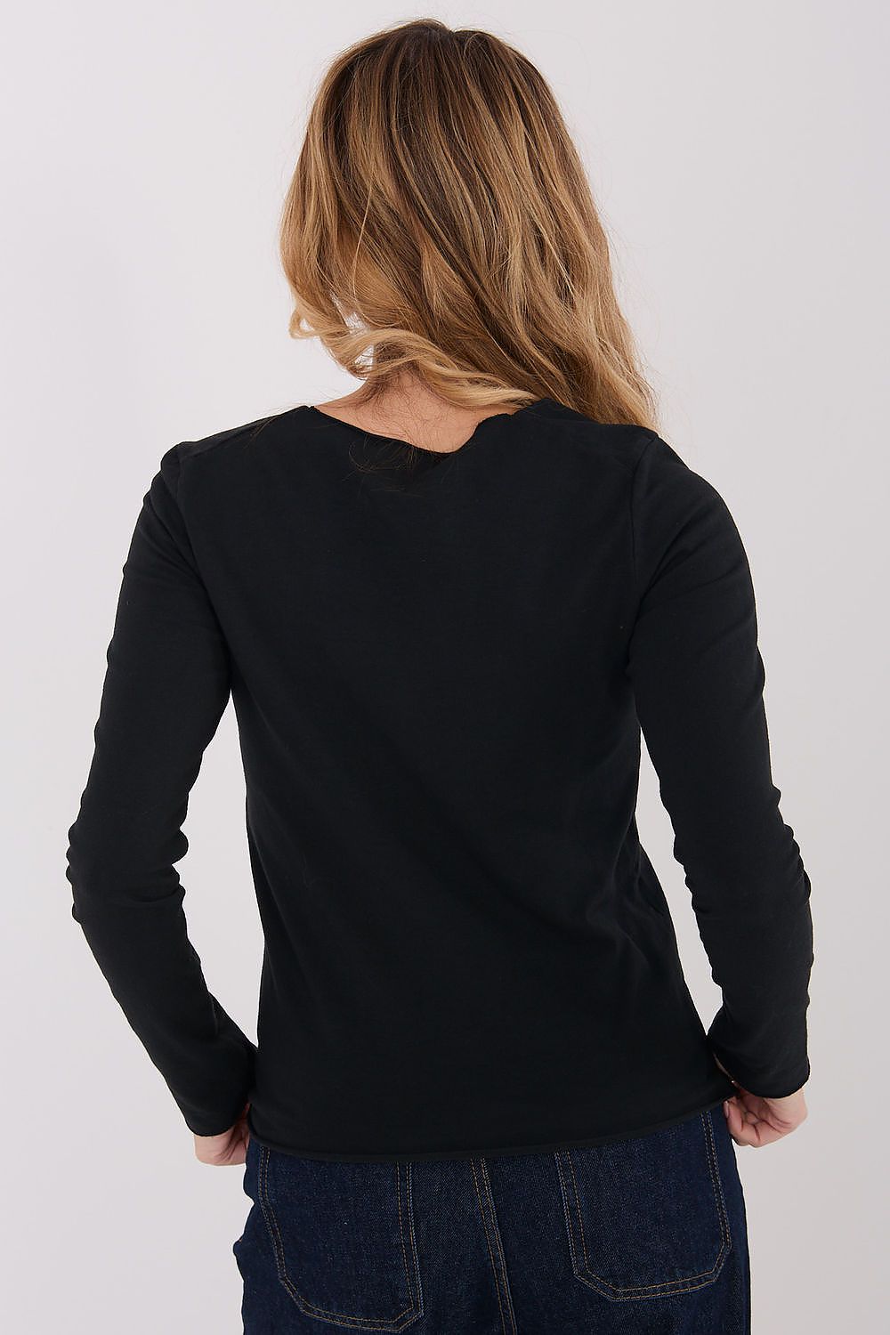 Black long-sleeve crew-neck blouse, back view with smooth, fitted cut.