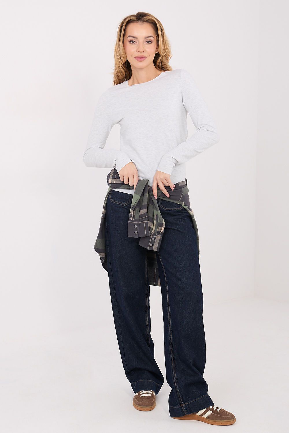 Light gray long-sleeve crew-neck blouse with a simple fitted design.