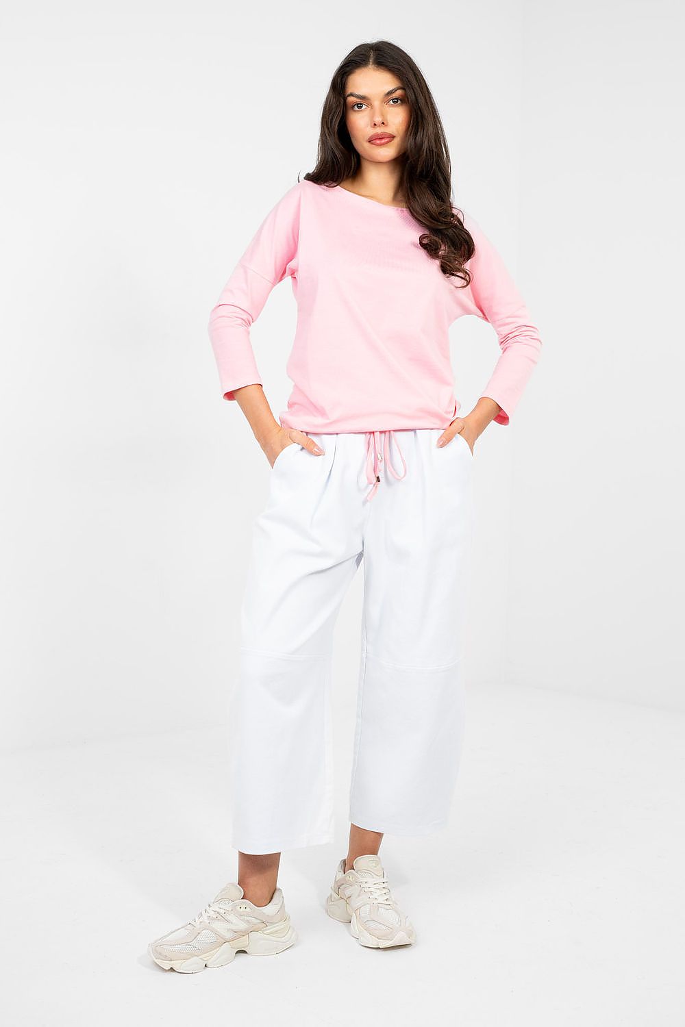 Pink blouse with round neckline and 3/4 sleeves, full front view