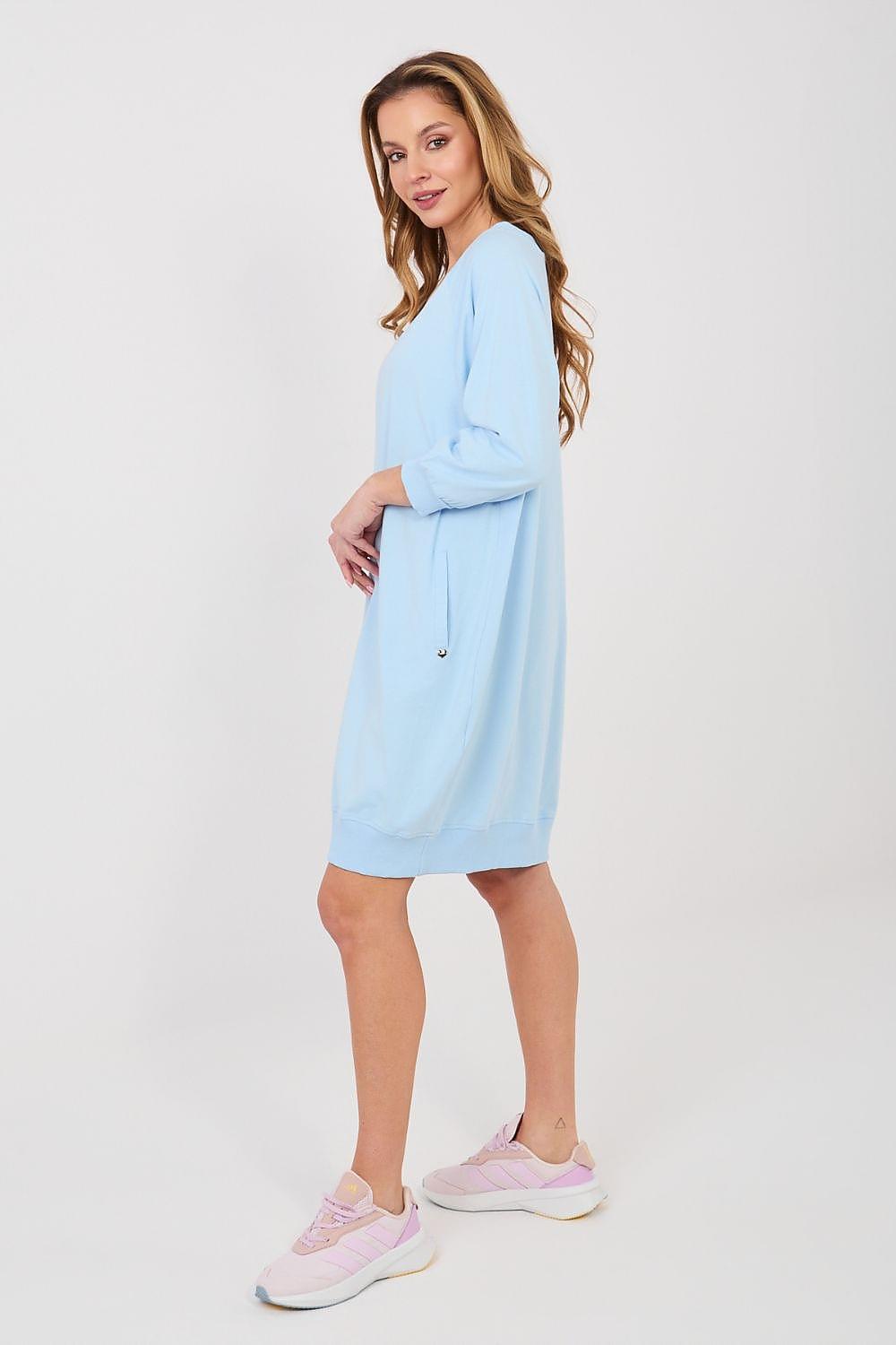 Light blue V-neck daydress with 3/4 sleeves, side view above the knee