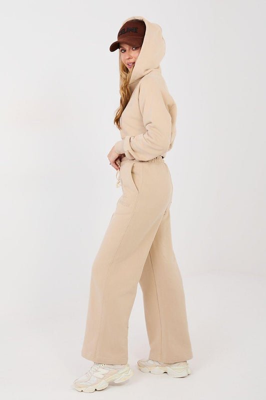 Beige two-piece hoodie and wide-leg pants set, side view with drawstring ties