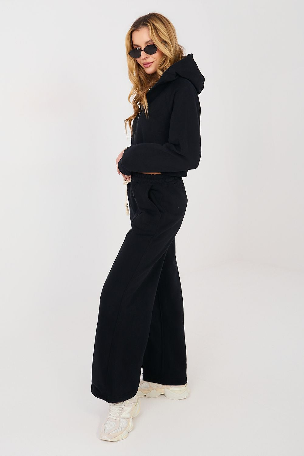 Black hoodie and wide-leg pants set with drawstring waist, side view