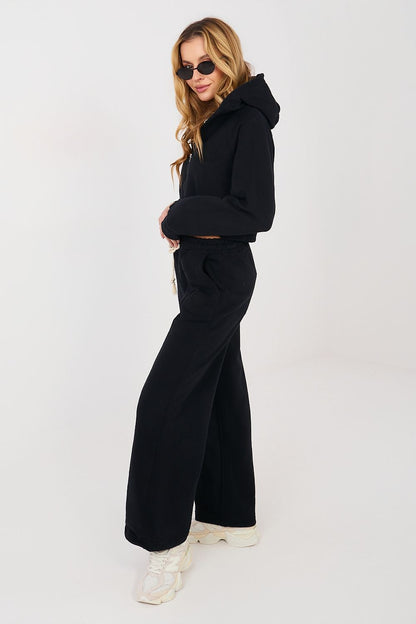 Black hoodie and wide-leg pants set with drawstring waist, side view