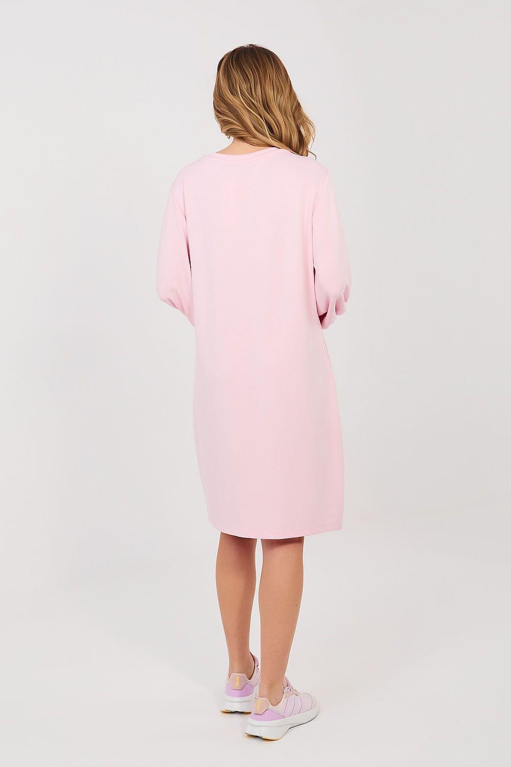 Light pink daydress with long sleeves and elastic cuffs, back view, knee length