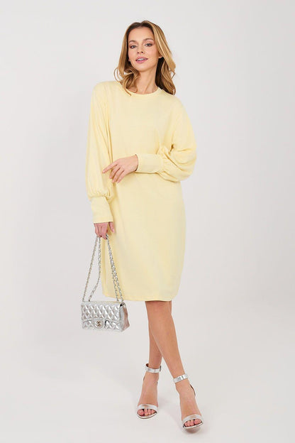 Yellow daydress with long balloon sleeves and round neck, straight knee-length fit