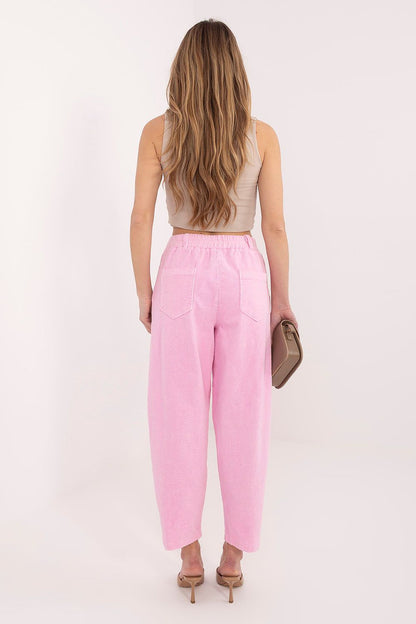 Corduroy trousers, pink, back view with waistband seam and pockets