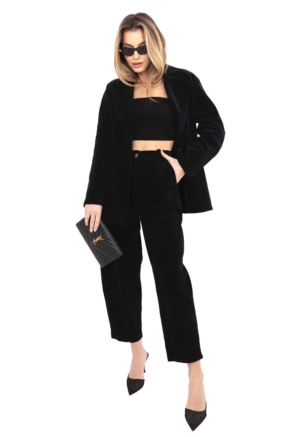 Black corduroy high-waist trousers with front crease and side pockets, tapered hem