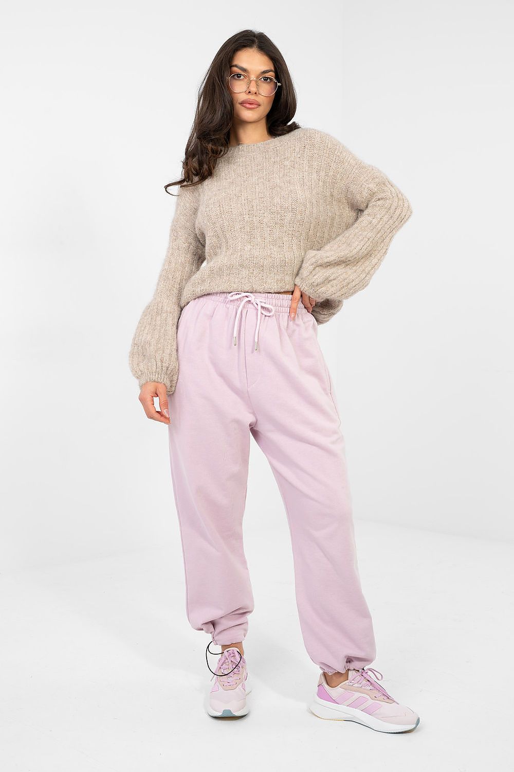Light pink tracksuit trousers with drawstring waist and cuffed hems
