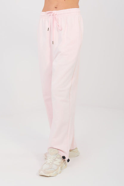 Light pink tracksuit jogger trousers with drawstring elastic waist and front seams