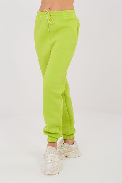 Lime green drawstring jogger trousers with elastic cuffs