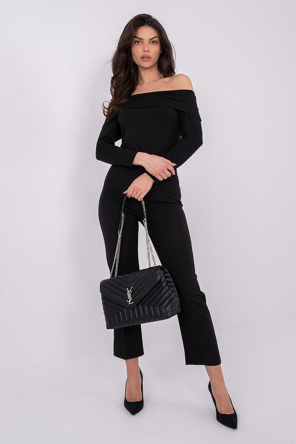 Black off-shoulder blouse with long sleeves, fitted waist and draped neckline