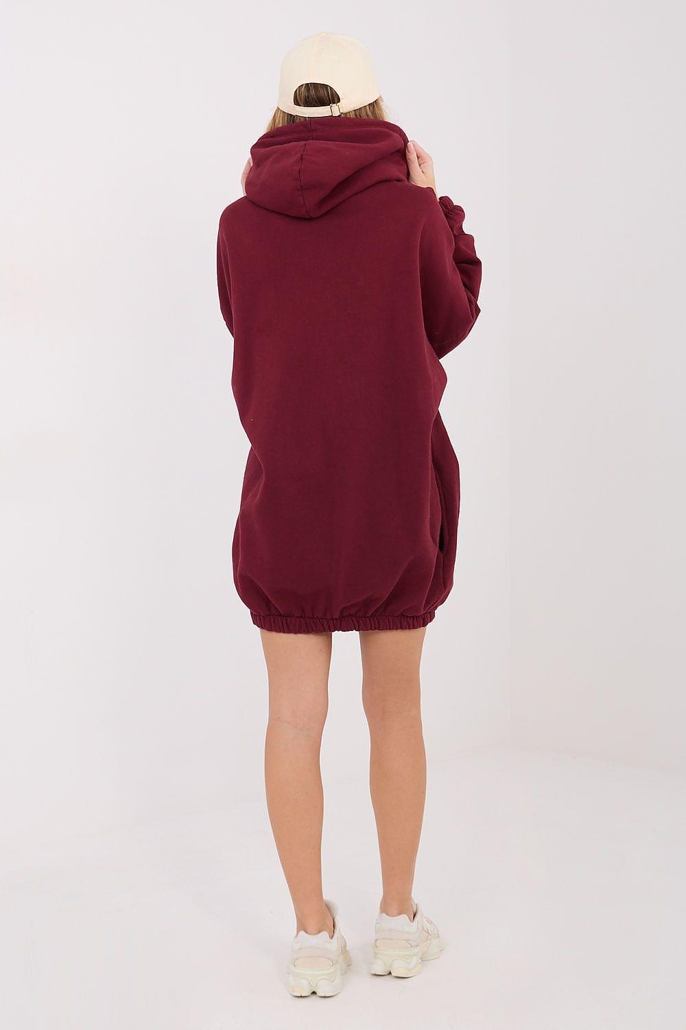 Burgundy hoodie daydress with hood, long sleeves, and relaxed A-line hem