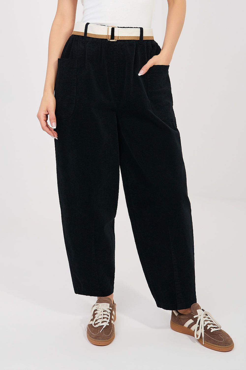 Corduroy trousers in black corduroy, front view with high waist and cuffed ankles