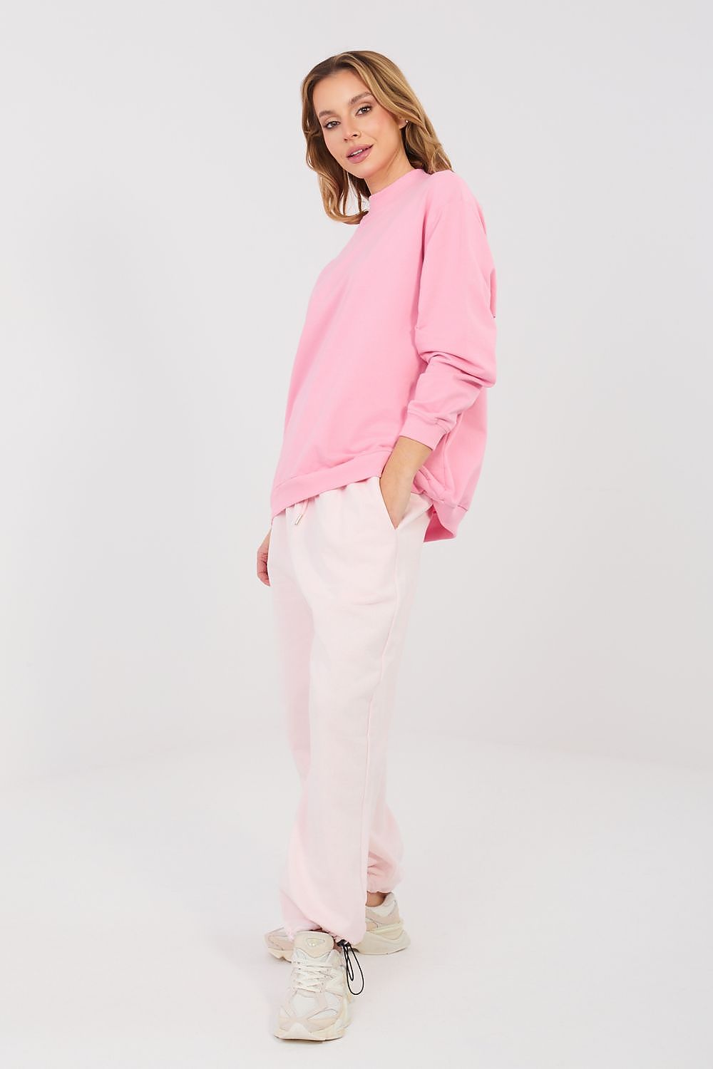Light pink tracksuit trousers with elastic drawstring waist and cuffed ankles