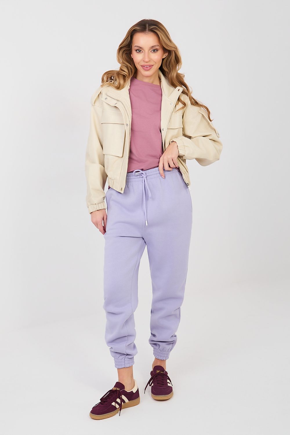 Lavender track jogger trousers with tapered legs, elastic cuffs, and drawstring waist