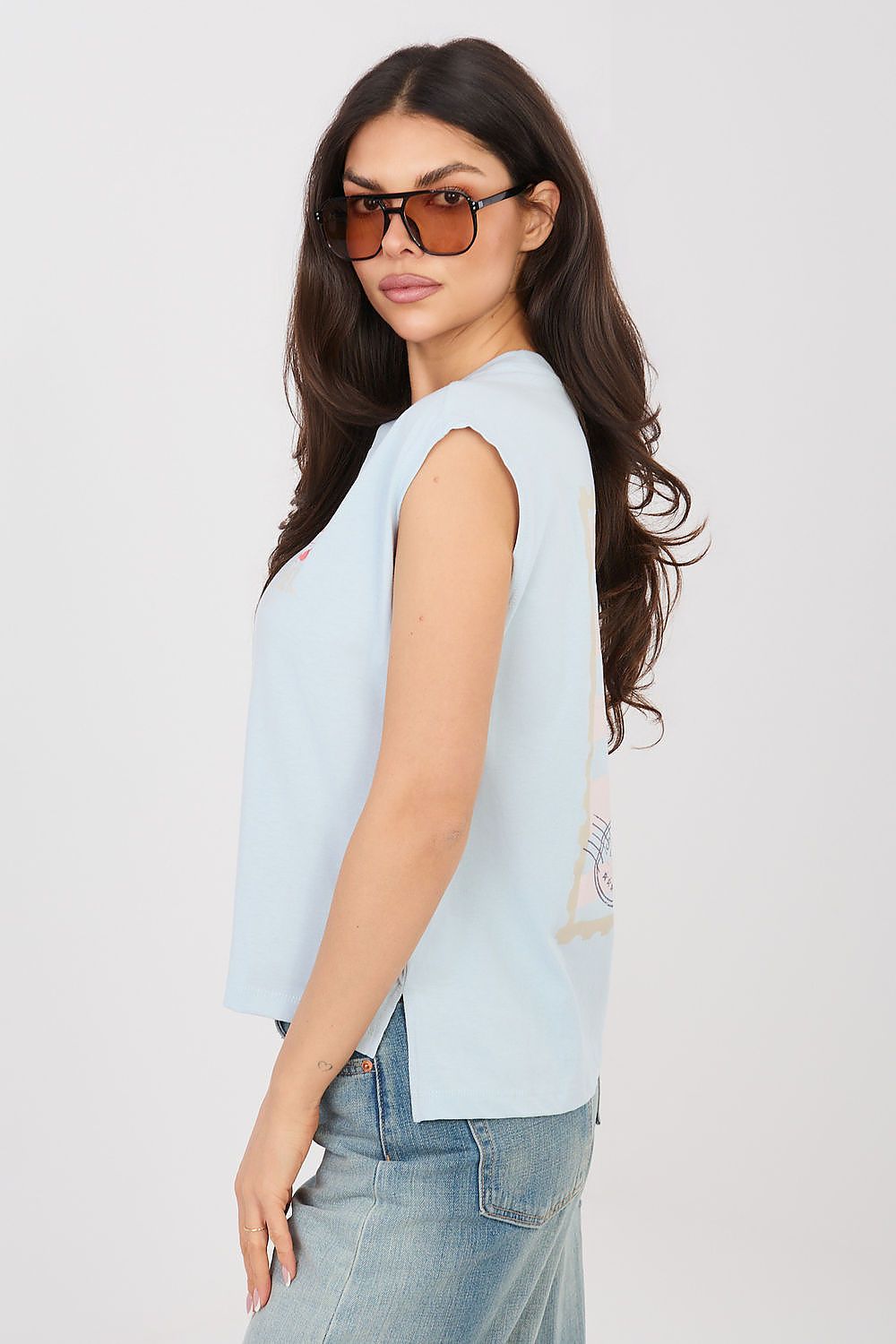 Light blue crew-neck T-shirt, side view with small chest graphic and short sleeves
