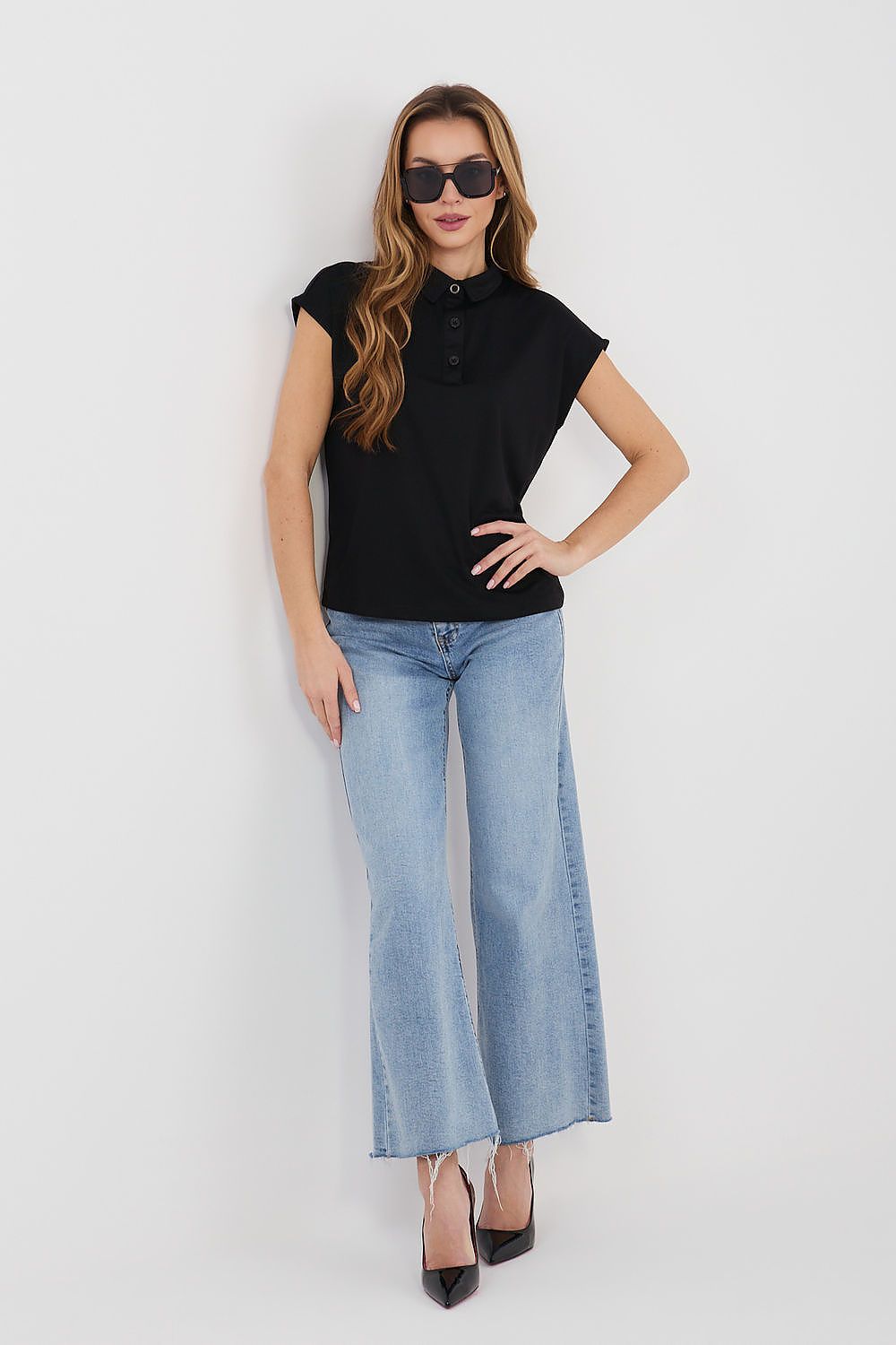 Black polo shirt with short sleeves and collar