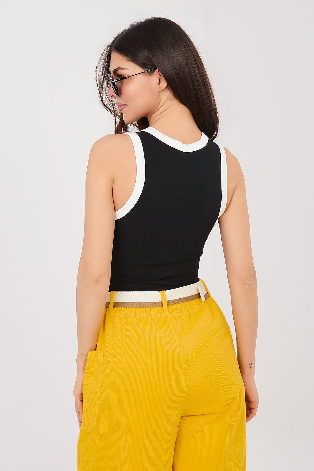 Black sleeveless tank top with white crew neckline and armhole trim.