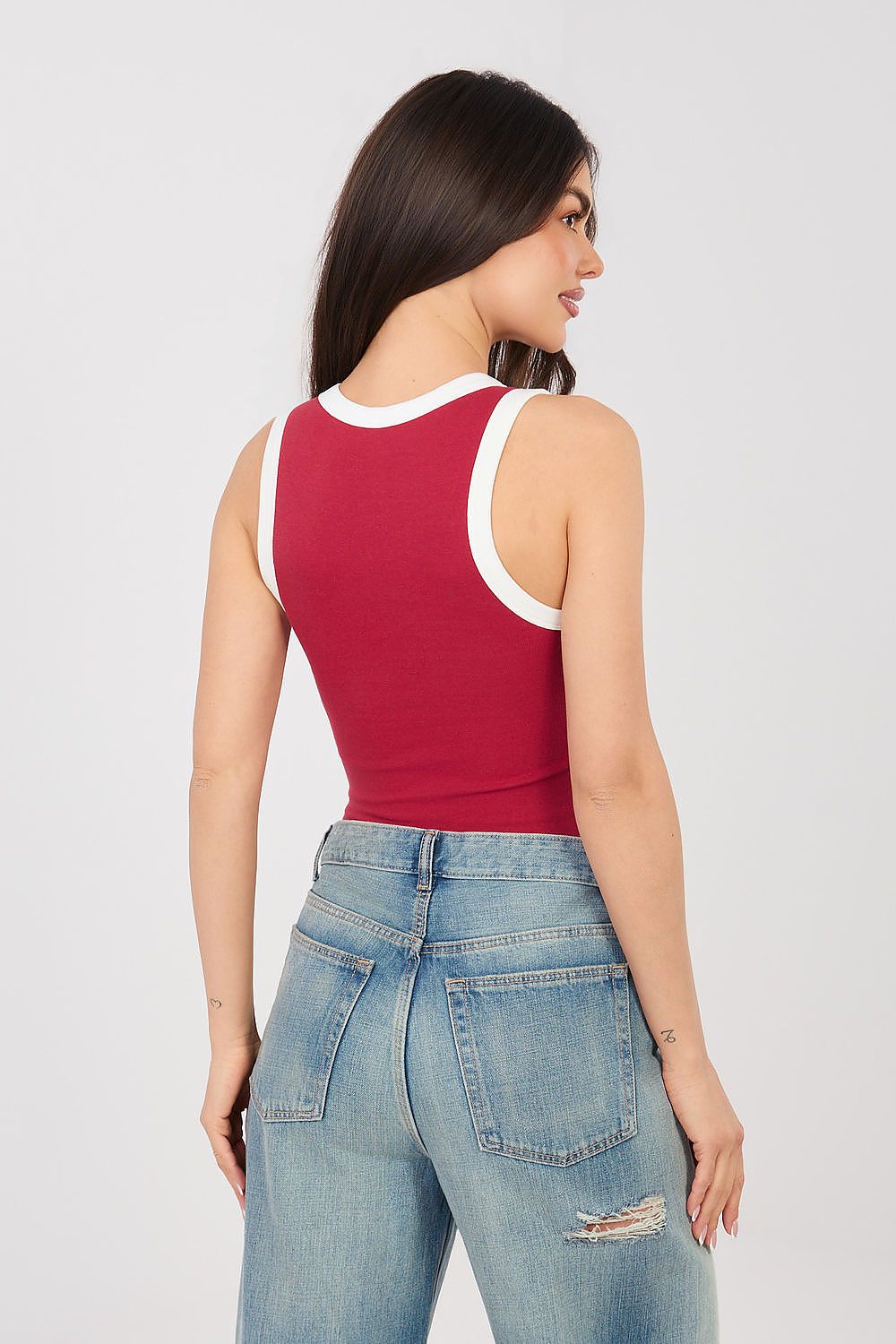 Red sleeveless tank top with white contrast back neckline and armhole trim.