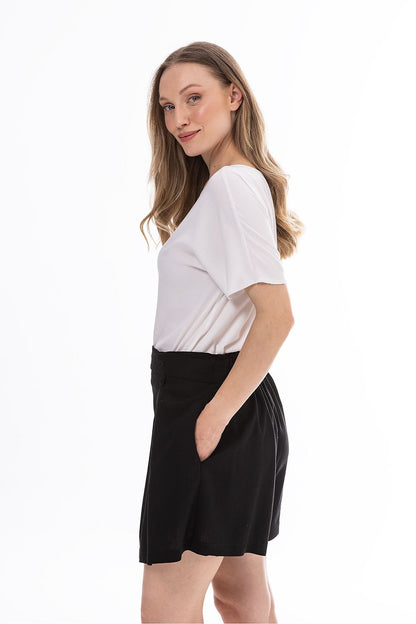 Black shorts with gathered waistband, side view