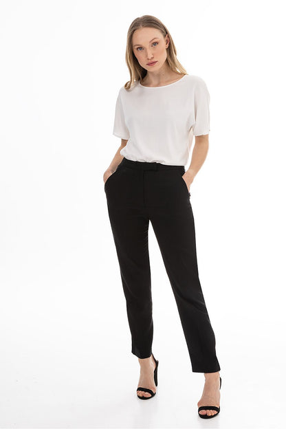 Women’s tailored trousers in black with tapered straight legs and slim ankle hem