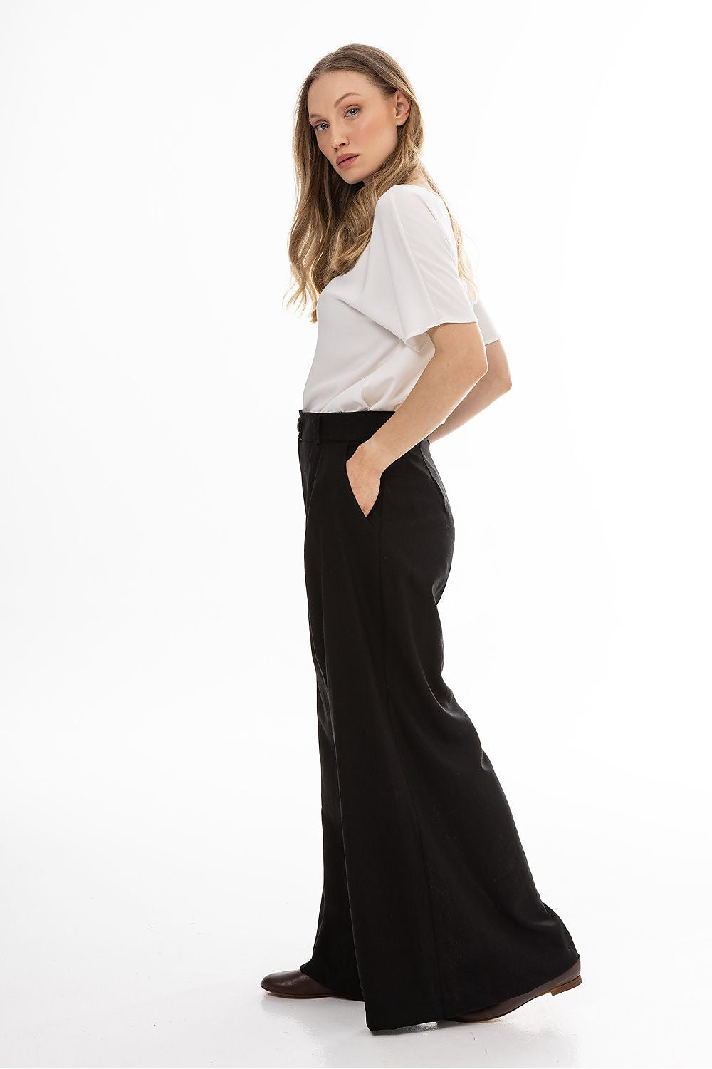 Awama women’s wide-leg trousers, black, front view with high waist and pleats