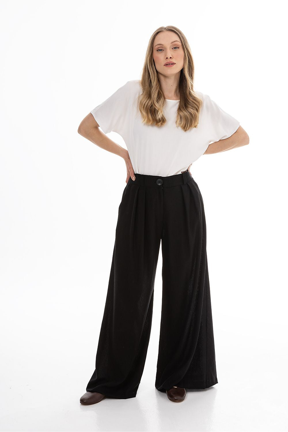 Awama women’s wide-leg trousers, black, full front view with belt loops and pleats