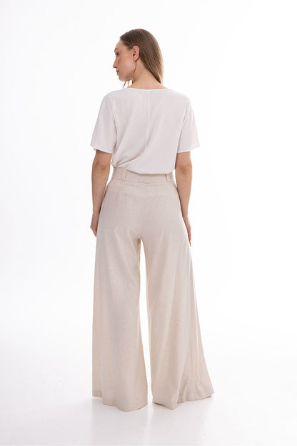 Awama women’s wide-leg trousers, light beige, back view with high waist and pleats