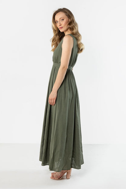 Green sleeveless V-neck daydress with belted waist and full maxi skirt, side view