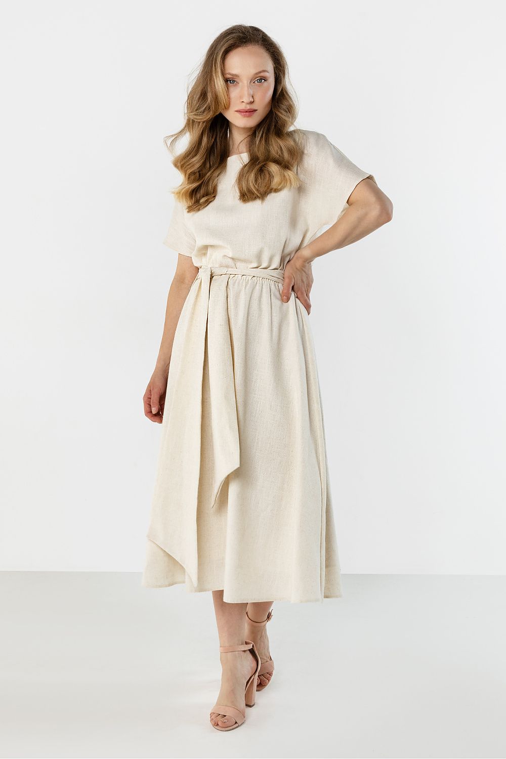 Cream day dress with short sleeves, tie waist belt and midi skirt