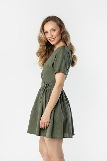 Olive green short-sleeve daydress with V-neck and tied waist seam