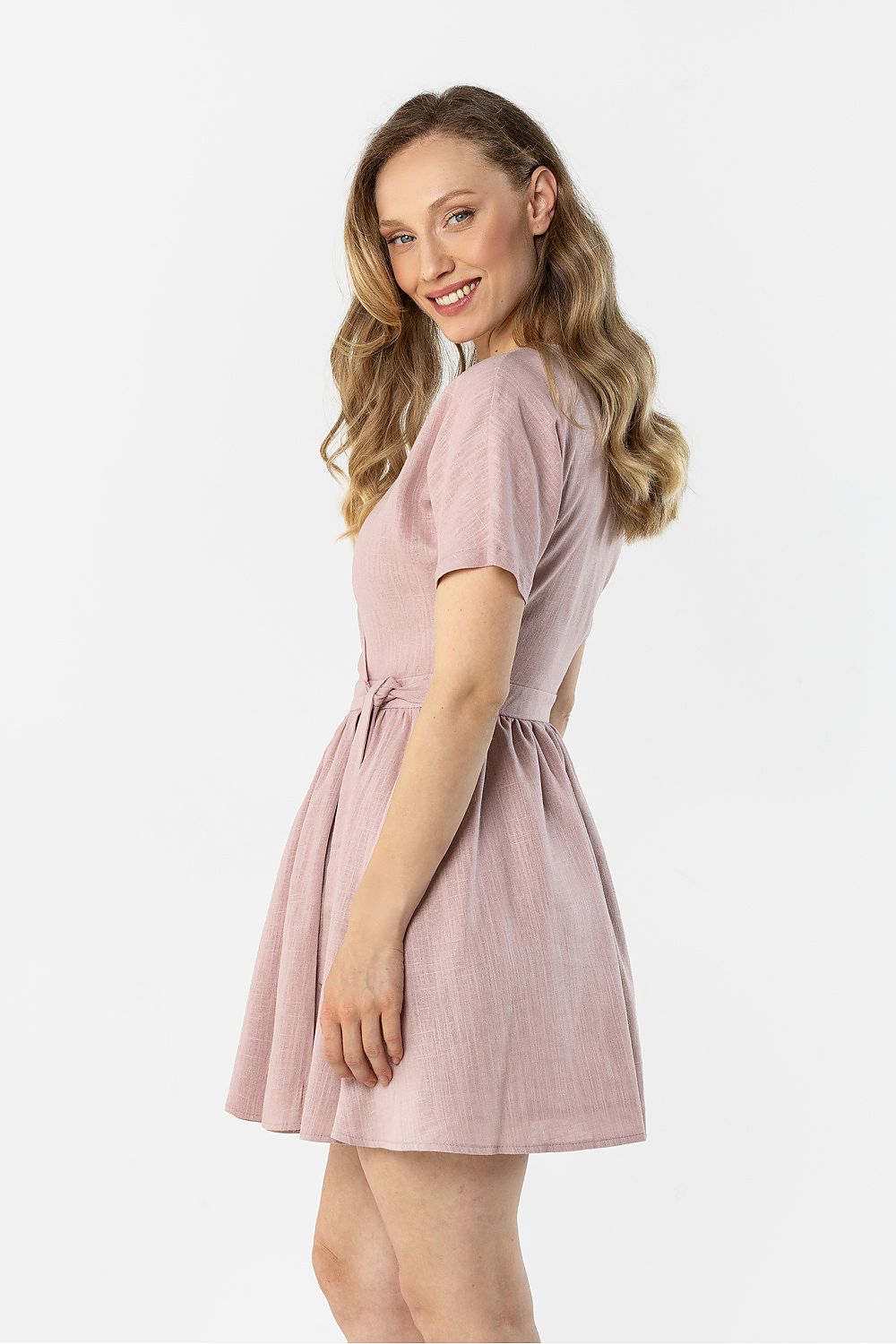Blush pink short-sleeve daydress with tied waist and flared A-line skirt
