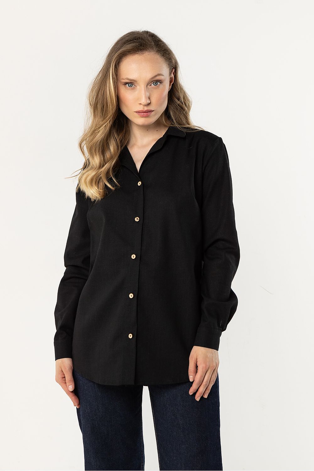 Awama long-sleeve shirt in black, front view with collared button placket