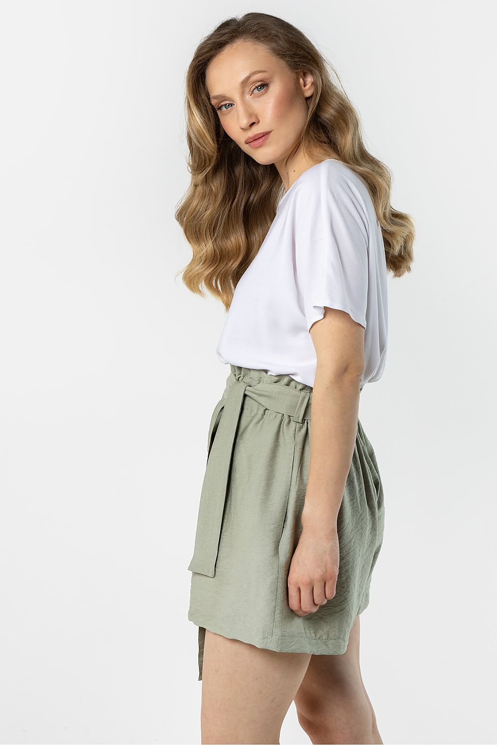 Olive green shorts with elastic waistband and long side-tie ribbon
