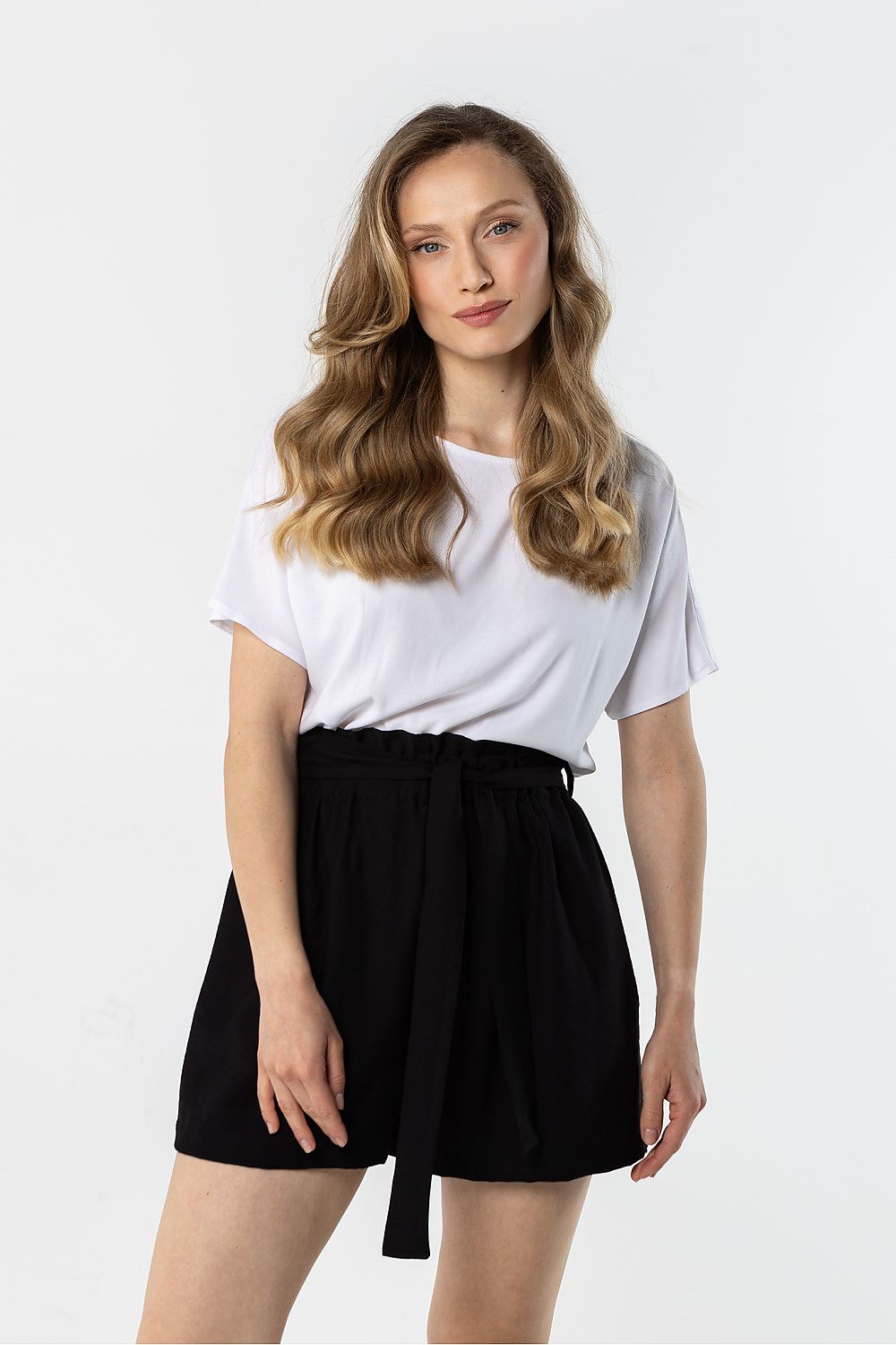 Black drawstring waist shorts with pockets and bow tie