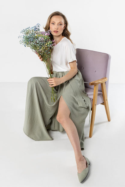 Long sage green skirt with gathered waist and dramatic front slit