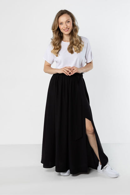 Black long skirt with gathered waistband and asymmetrical side slit