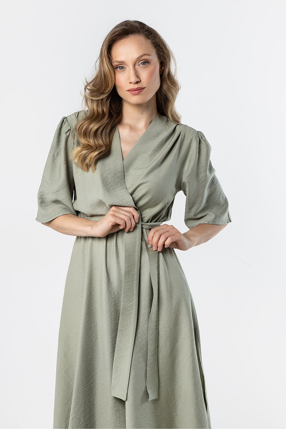 Olive green wrap daydress with puff sleeves, V-neckline, and waist tie