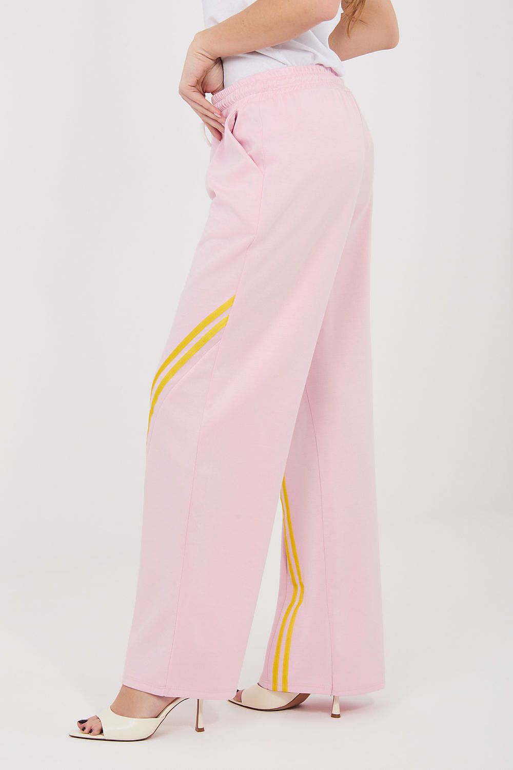 Tracksuit trousers, soft pink with yellow side stripe, wide legs and drawstring elastic waist